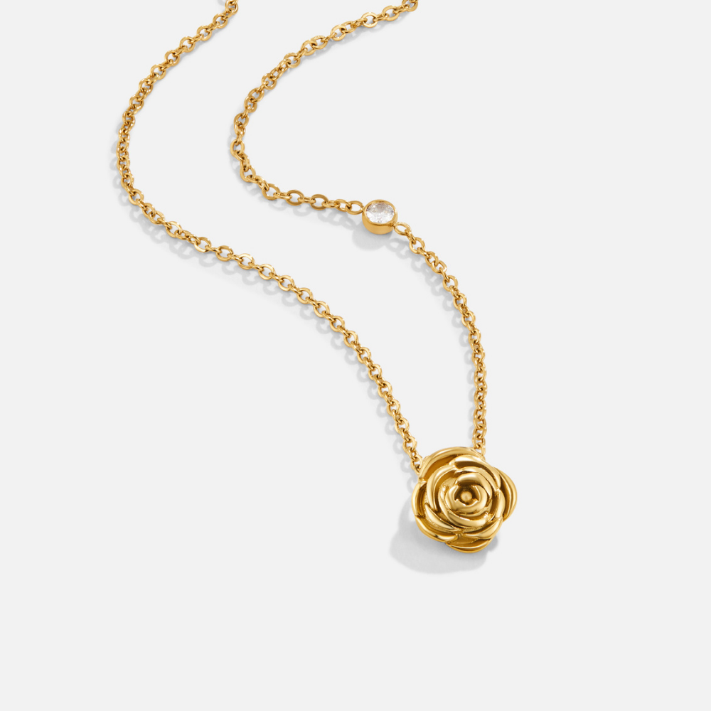 Collar con colgante de rosas doradas