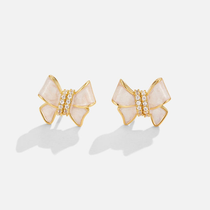 Pendientes de lazo blanco cristalino