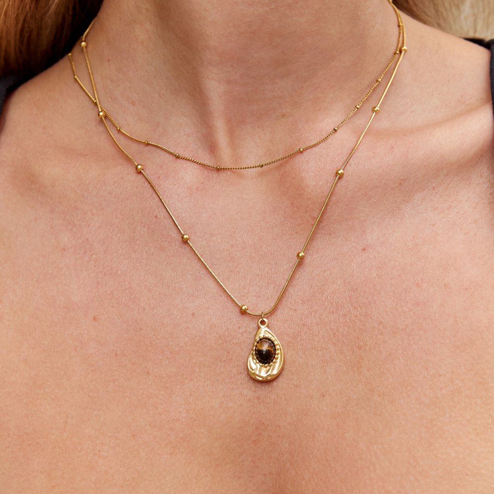Collar con colgante de Tigerstein